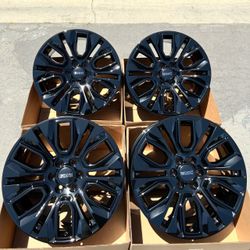 22” GMC Denali original factory rims in new gloss black