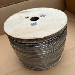 Bulk spool of heavy-duty 3mm (1/8") 7x7 steel cable wire rope. Totaling approximately 1,300 feet and weighing 41.6 lbsPerfect for garage doors, fencin