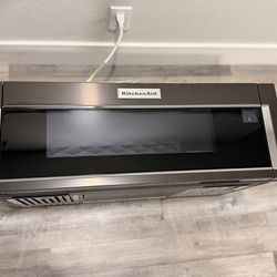 Low profile microwave  over the range NEW kitchen aid 30”
