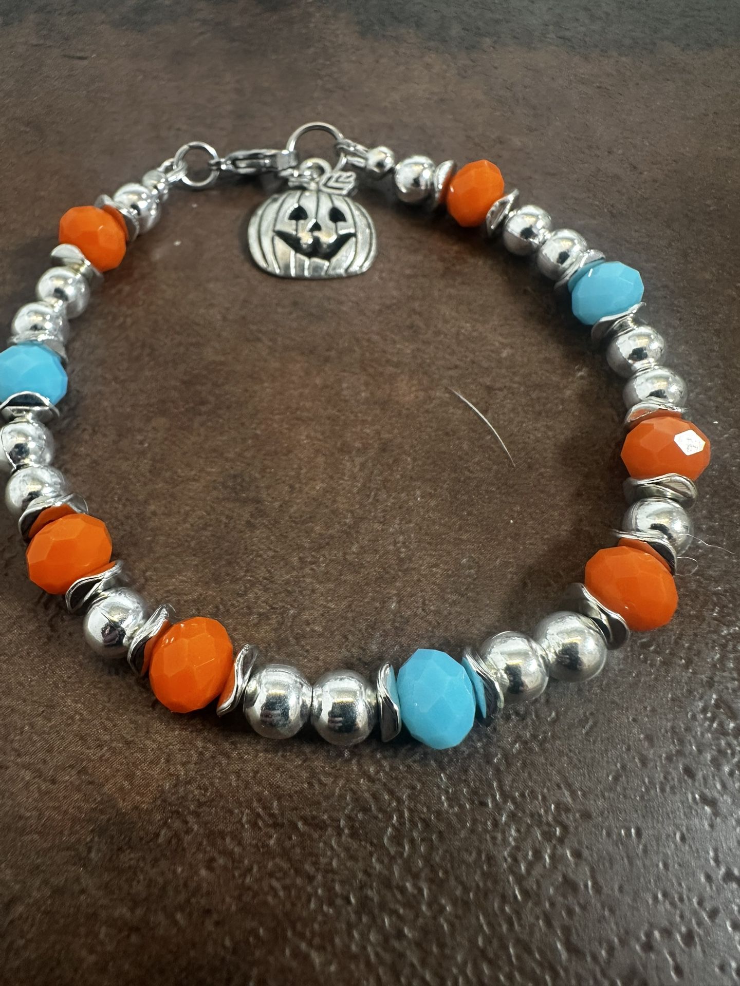 Silver Beaded Bracelet with Orange and Blue Crystal Accents