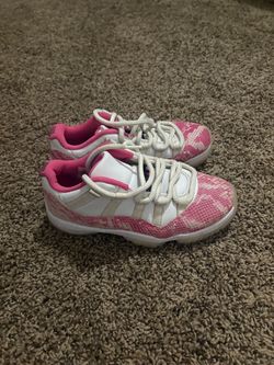 Air Jordan 11 Low Pink Snakeskin Sneakers