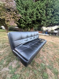 Black leather foldable couch