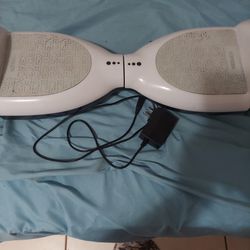 Hoverboard Slightly Used, Bluetooth, Few Scratches And A Mark. But Overall It Works Just Fine Might Need A Little Cleaning Up Though 