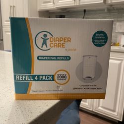 Brand New Diaper Dekor Refill 4 Pack Plus Extra Opened Pack