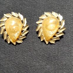 Unique Gold tone clip-on earrings  leaf design.