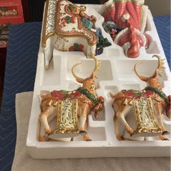 Kirkland signature Santa and sleigh with reindeer candleholders handpainted ceramic