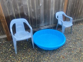 2 plastic chairs and pool
