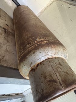 Rusty metal cylinder tank