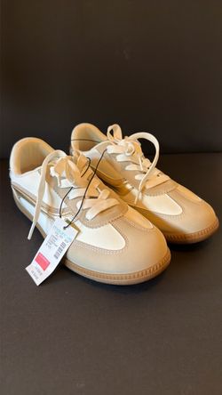 New Maurice’s white and gold sneakers size 8.5