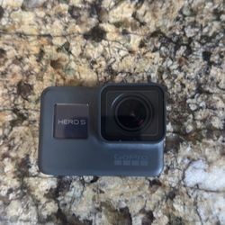 GoPro Hero 5 with Hand Tripod