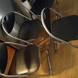 Four Folding Chairs. 