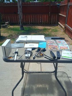 Nintendo Wii with 5 games