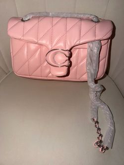 Pink quilted handbag