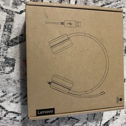 New Lenovo USB headset in box.