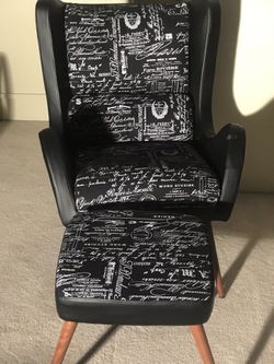 New black and white chair with matching ottoman