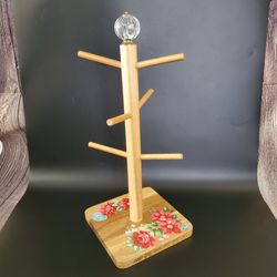 The Pioneer Woman "Vintage Floral" pattern name. 16.5" inches tall, base 7"x7". Mug Tree