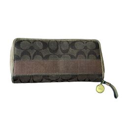 Coach Zippered Wallet (Authentic) Brown  This Coach zip-around wallet is a must-have for any fashion-forward woman. With its sleek brown design and fu