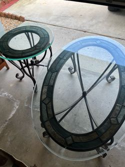 Ashley Furniture Danbury round end table & oval sofa table featuring a metal frame with a slate tile inlay and a