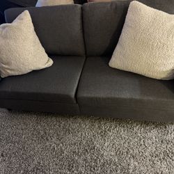 Love Seat And Grey Sofa