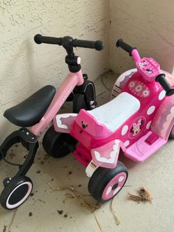 Girls bicycles and motor scooter