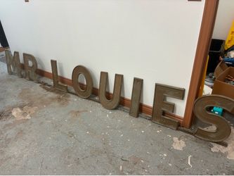 Rod iron sign