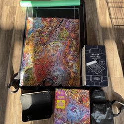 The Puzzled Patron 1000-Piece Jigsaw Puzzle + Roll Up Puzzle Pad (Purchased August 2024)