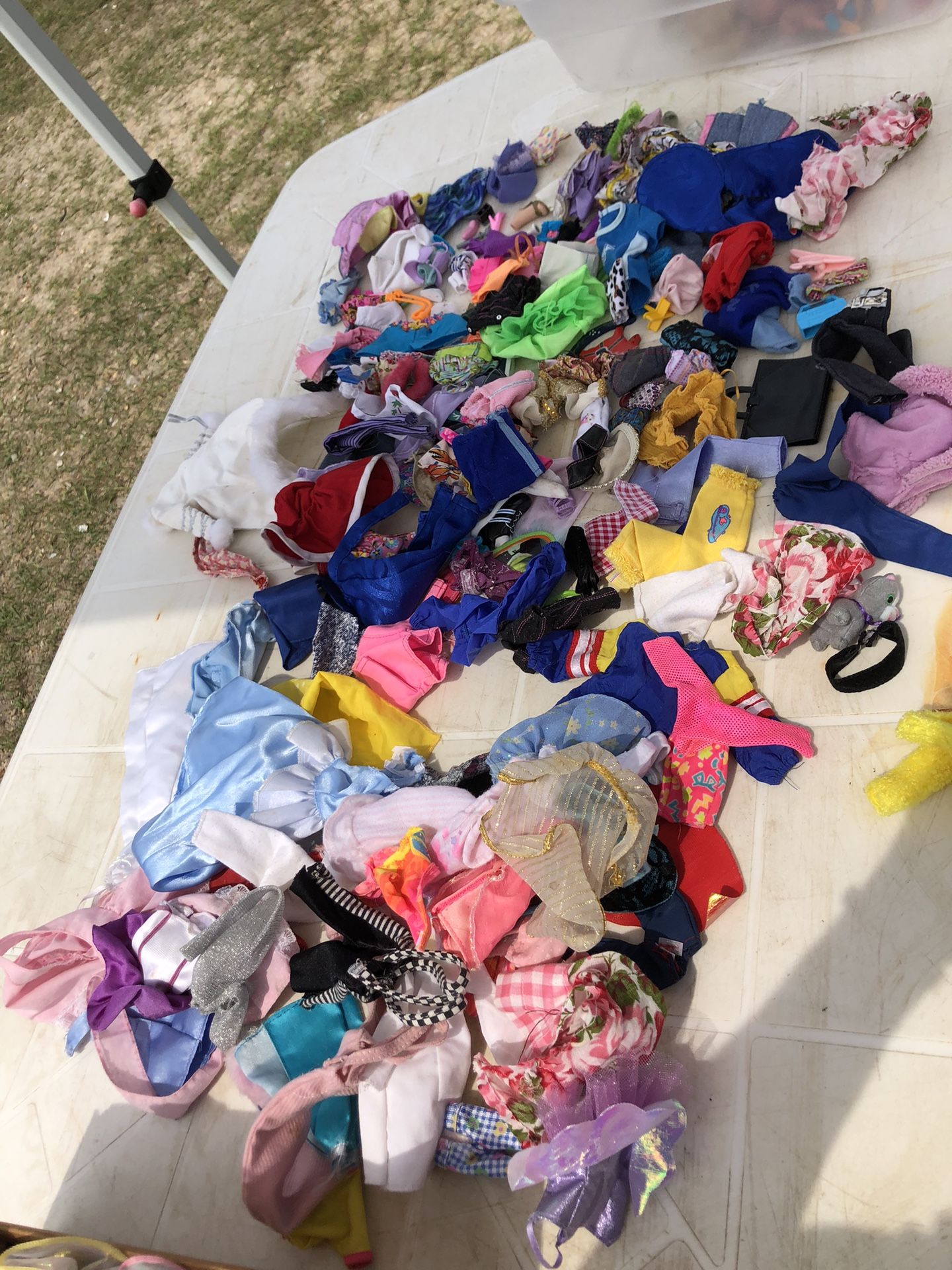 Barbies And Doll Clothes And A Few Small Dolls Lot