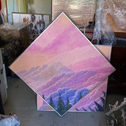 Diagonal canvas paintings with silver frames