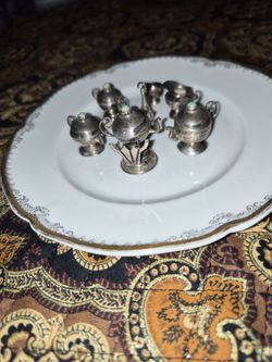 Tiny silver tea set
