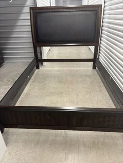 Queen size walnut headboard, footboard, wooden rails, and support rack
