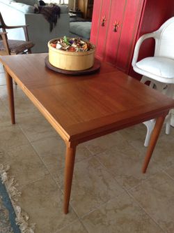 teak dining room table approx 36 x 52 expands to 104 twice it's size