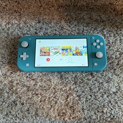 Nintendo Switch Lite - Blue Comes With Case
