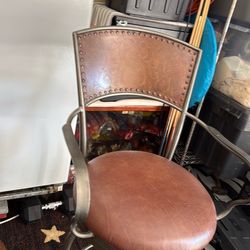 Pair of Artística Stamped Back Swivel Bar Stools