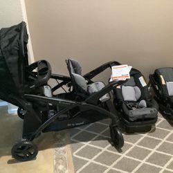 Baby trend sit stand double stroller, black gray trim, detachable car seats
