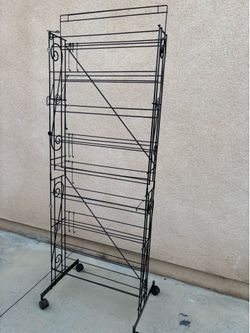 Storage organizer shelf 24 x 7 x 70“ good condition with roller