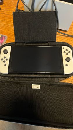 Nintendo Switch + Games + Controller Base