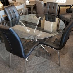 Brand New 48" Glass Dining Table + 4 Black Faux Leather Chairs