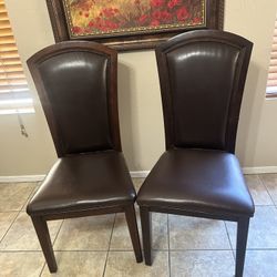 2 Leather Brown Chairs 