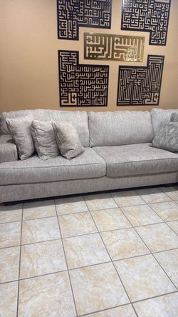 Large light brown Fabric Sofa with Throw Pillows