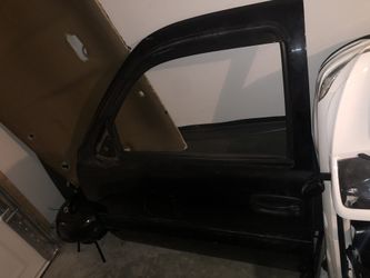 2005 Cadillac Escalade front doors.