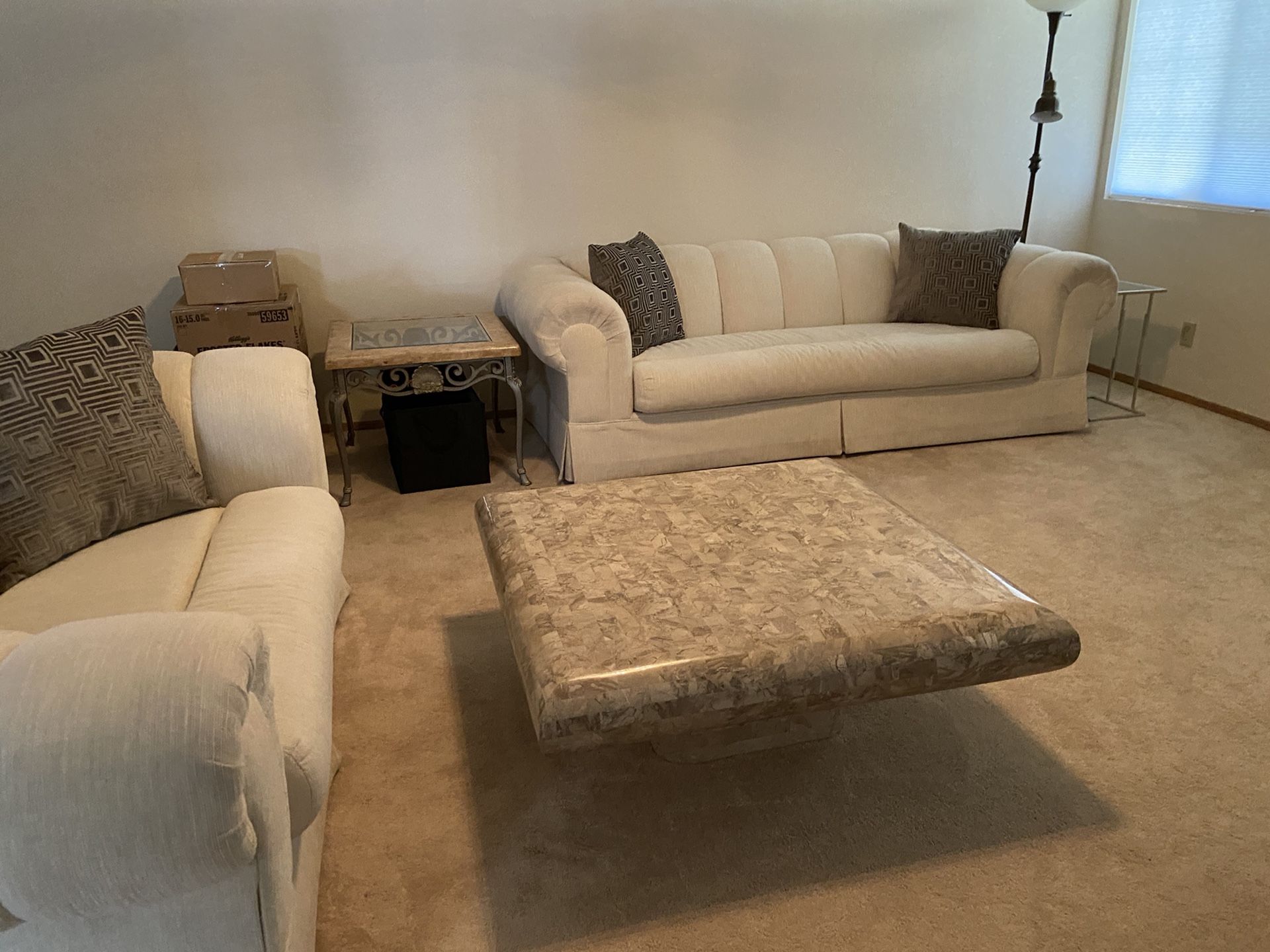Off white cloth sofa & matching loveseat with unique coffee table. Total $400 OBO