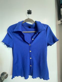 Blue button top woman’s