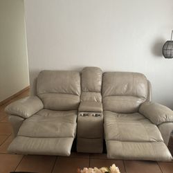 Electric  reclining beige leather sofa