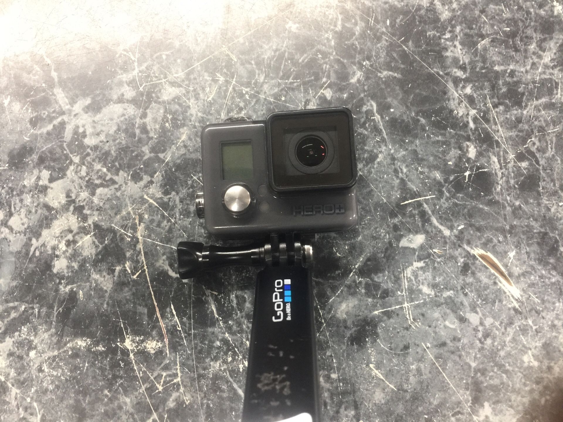 Go pro hero plus with adapter and selfie stick