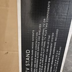 TV Stand. Never Opened. 