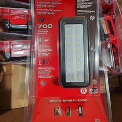 MILWAUKEE  M12 MECHANIC/ REPAIR  LIGHT 700 LUMENS WITH BATTERY AND CHARGER, NEW, FIRM