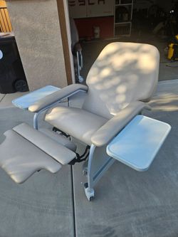 Mobil Leather wrapped recliner with built-in heat and massage