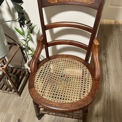 Antique Victorian style walnut cane-seat ladder-back armchair