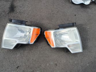 2009-2014 Ford F-150 Headlights With Light Bulbs And Accessories Oem.