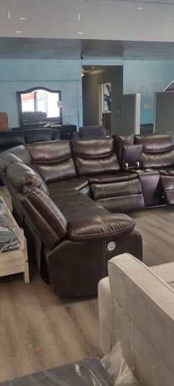 New sectional sofa with three power recliners on sale now